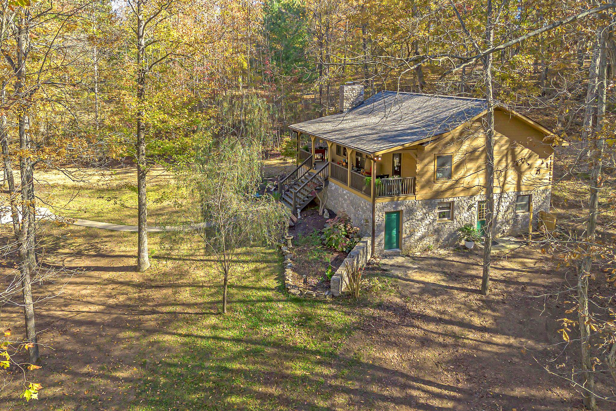 5833 Dewey Carr Road Bethpage, TN 37022 - Photo 11 of 60 a view of a house with a backyard