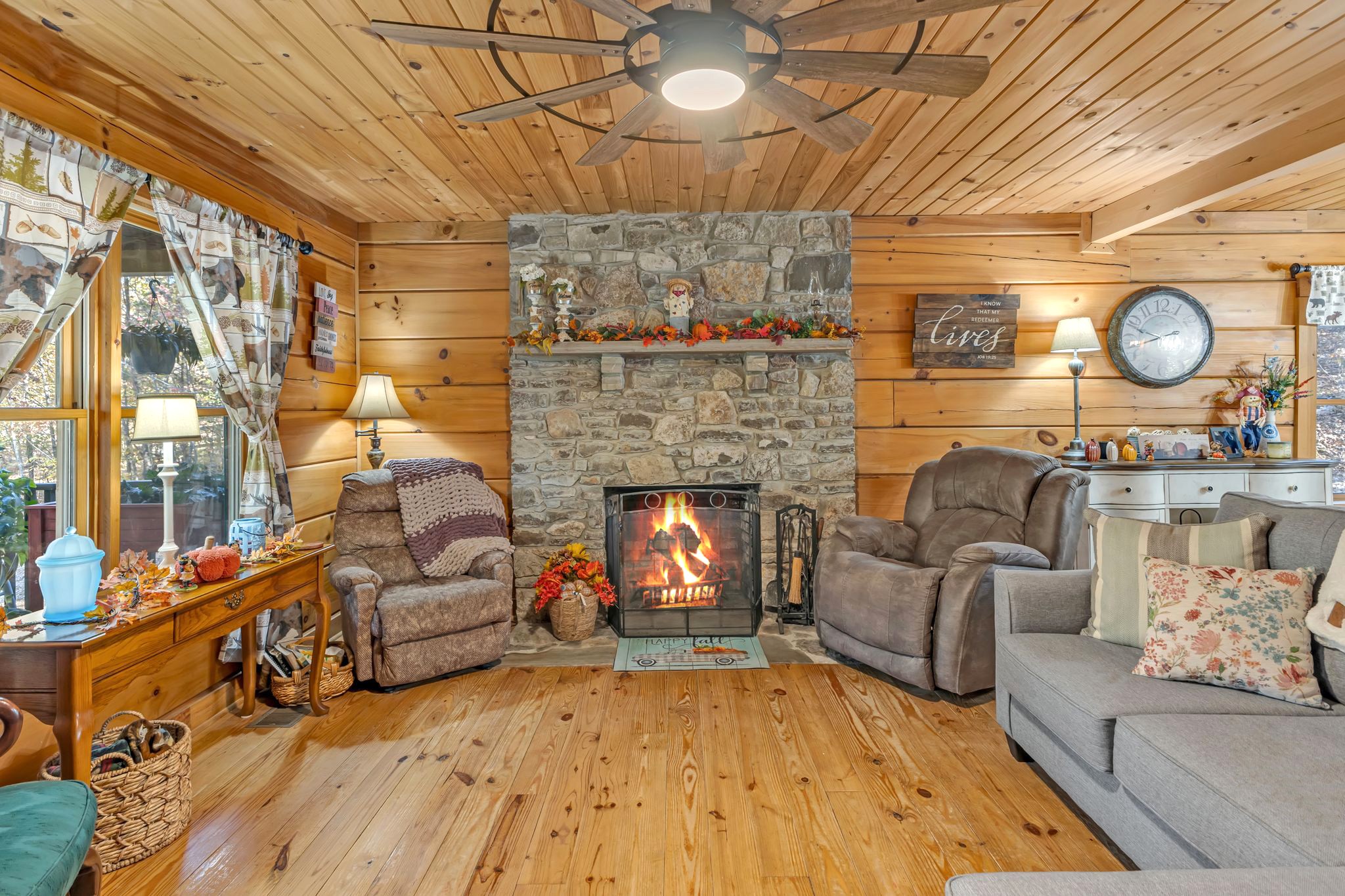 5833 Dewey Carr Road Bethpage, TN 37022 - Photo 15 of 60 a living room with furniture and a fireplace