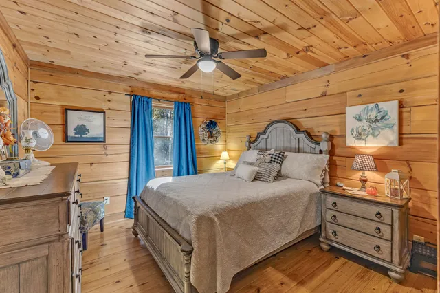 a bedroom with a bed and a closet