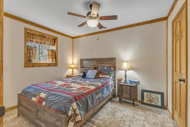 a view of living room with a table and chairs