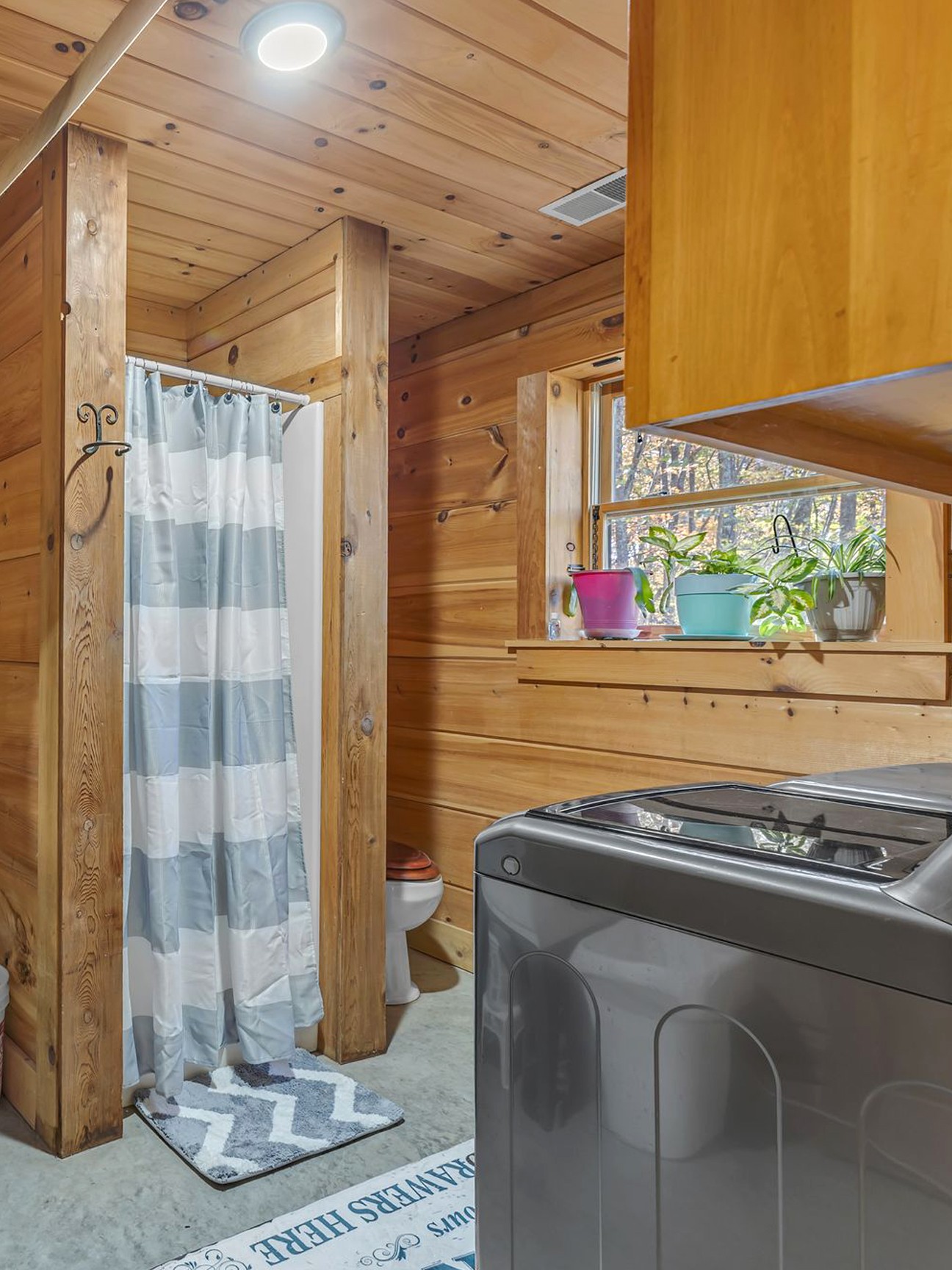 5833 Dewey Carr Road Bethpage, TN 37022 - Photo 40 of 60 a bathroom with a granite countertop sink and a mirror