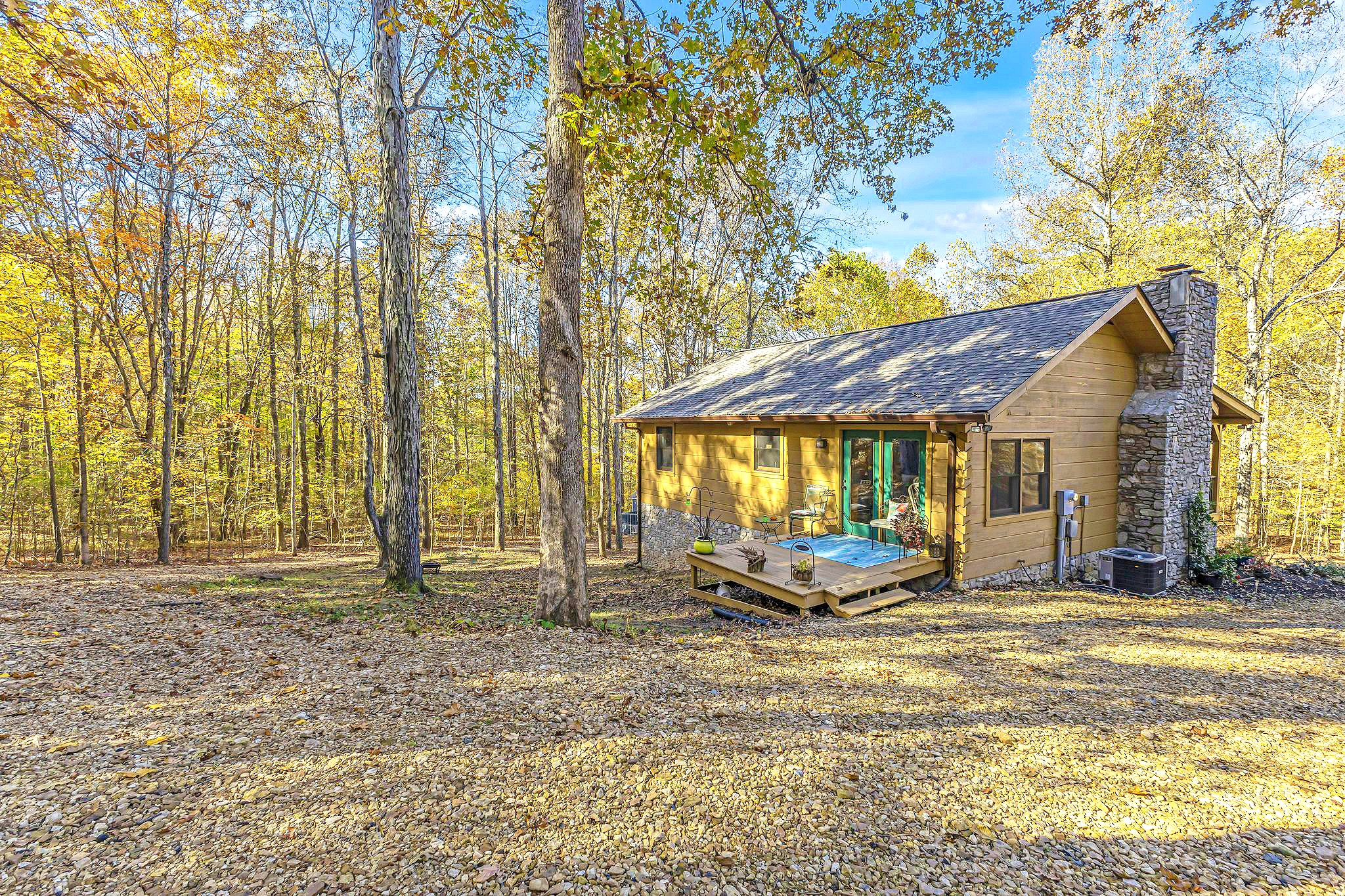 5833 Dewey Carr Road Bethpage, TN 37022 - Photo 46 of 60 a backyard of a house with table and chairs