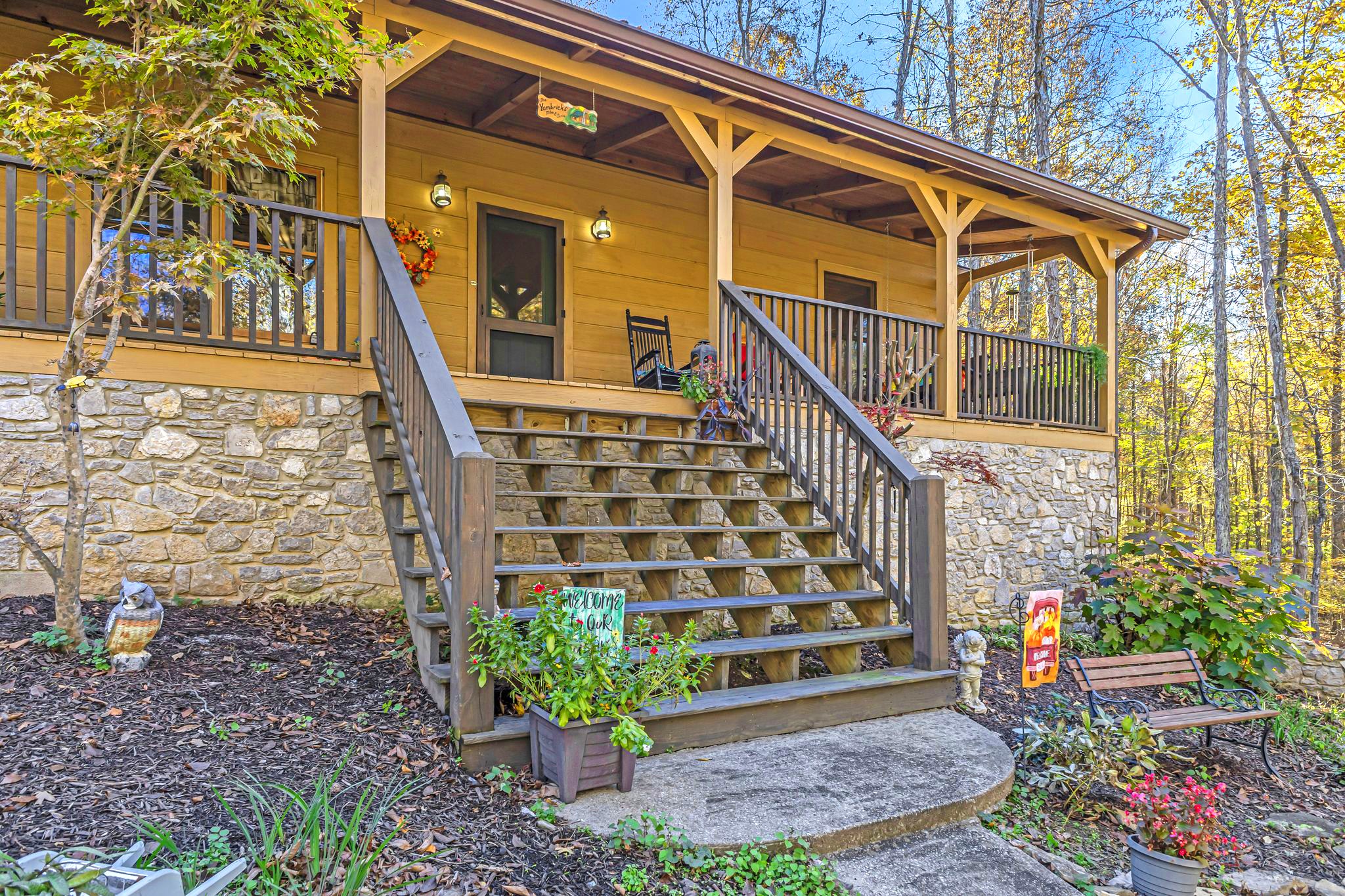 5833 Dewey Carr Road Bethpage, TN 37022 - Photo 5 of 60 a view of front door of house with wooden stairs
