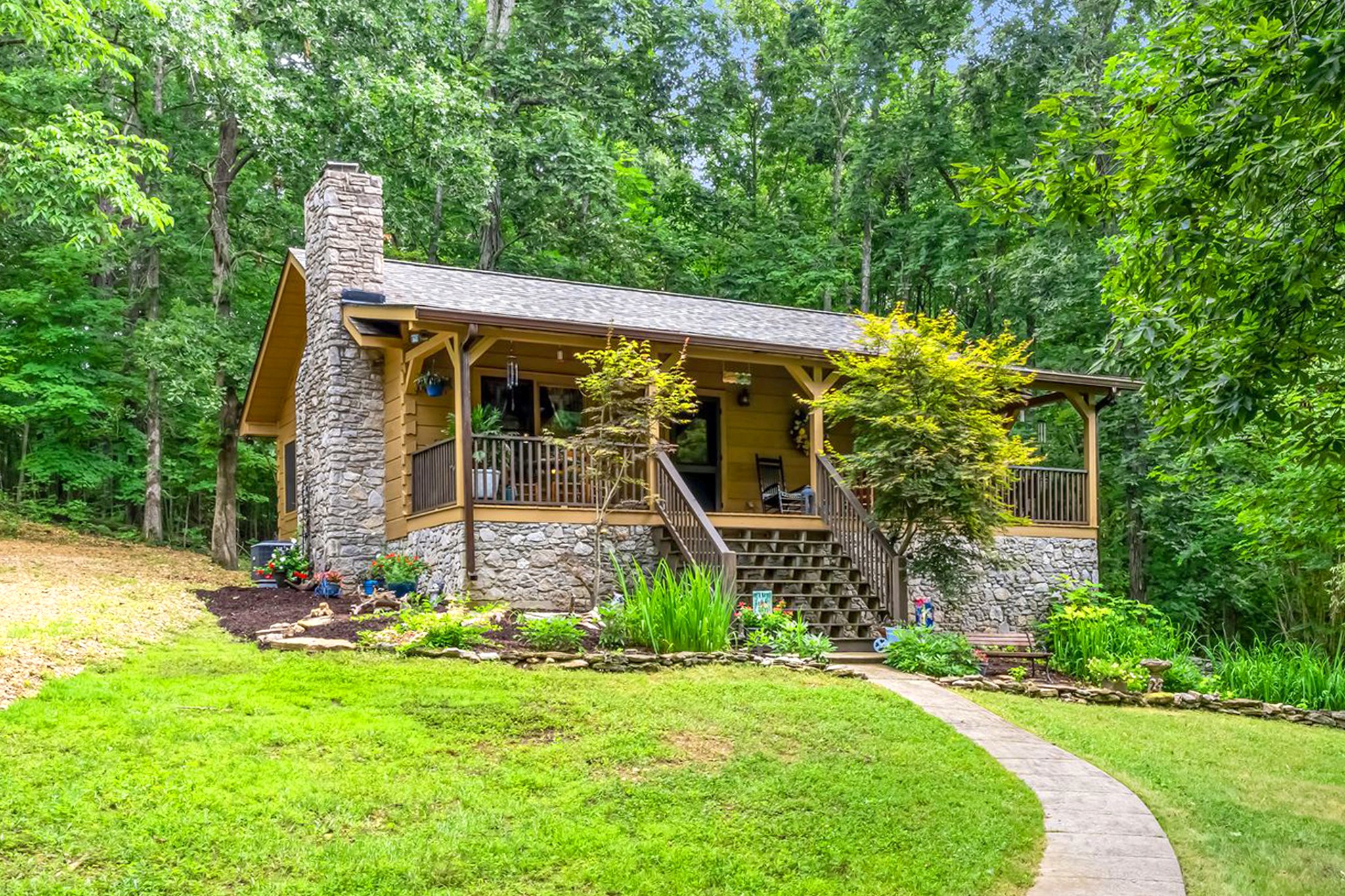 5833 Dewey Carr Road Bethpage, TN 37022 - Photo 6 of 60 a front view of a house with garden