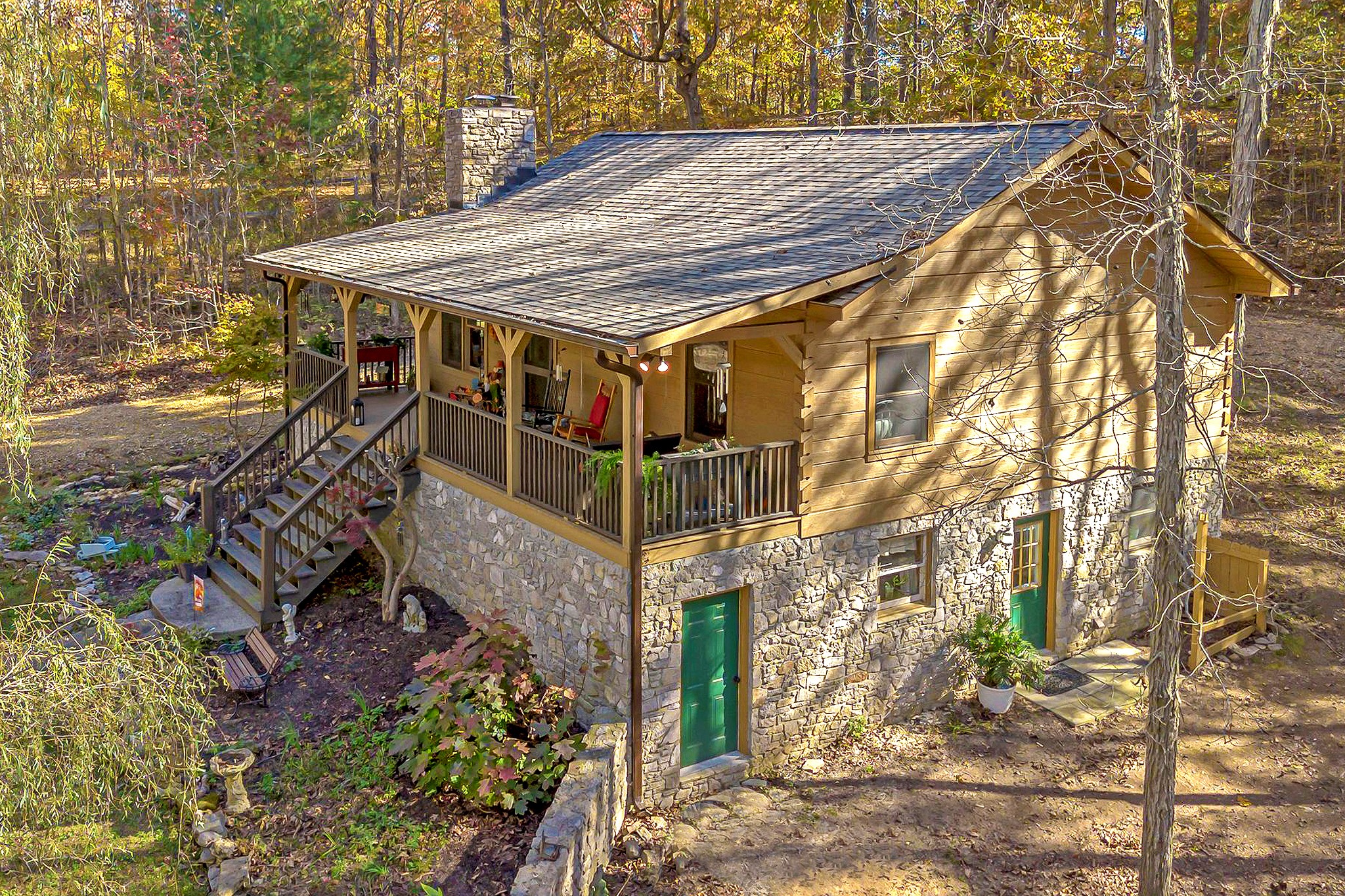 5833 Dewey Carr Road Bethpage, TN 37022 - Photo 10 of 60 a roof deck with tall trees