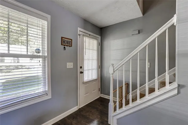 a view of an entryway with staircase