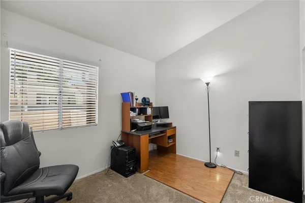 an aerial view of a house with a garden