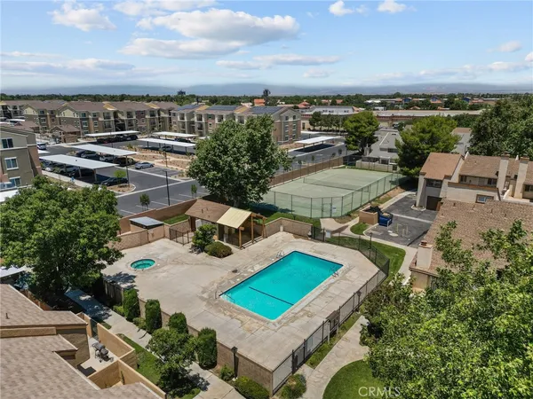 an aerial view of a house with outdoor space
