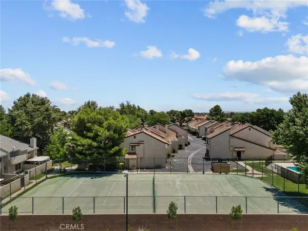 an aerial view of a house with a garden