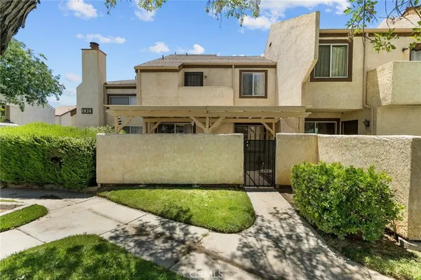 a front view of a house with a garage