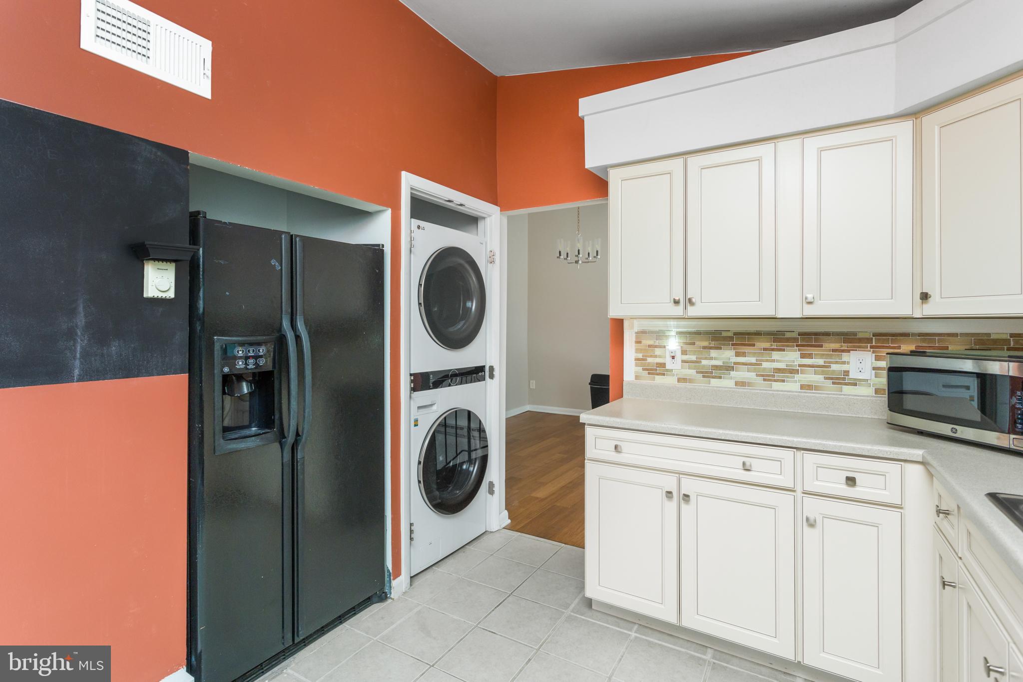 41 Overlook Drive Clinton, NJ 08809 - Photo 16 of 24 a utility room with dryer and washer