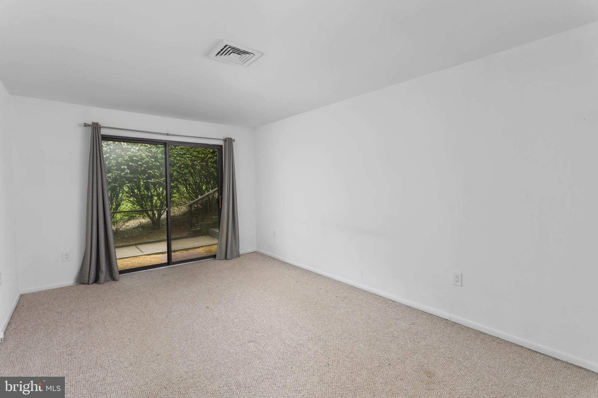 41 Overlook Drive Clinton, NJ 08809 - Photo 17 of 24 a view of an empty room with a balcony