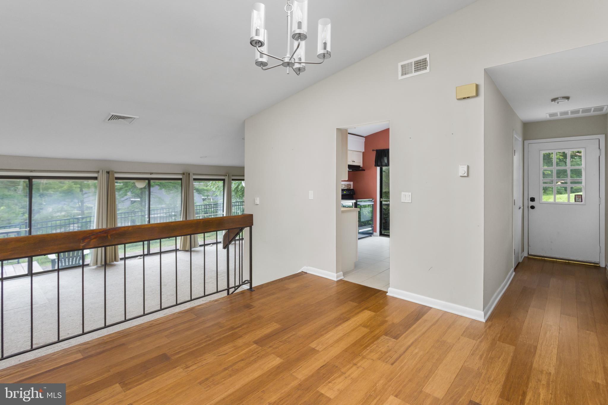 41 Overlook Drive Clinton, NJ 08809 - Photo 7 of 24 wooden floor in an empty room with a window