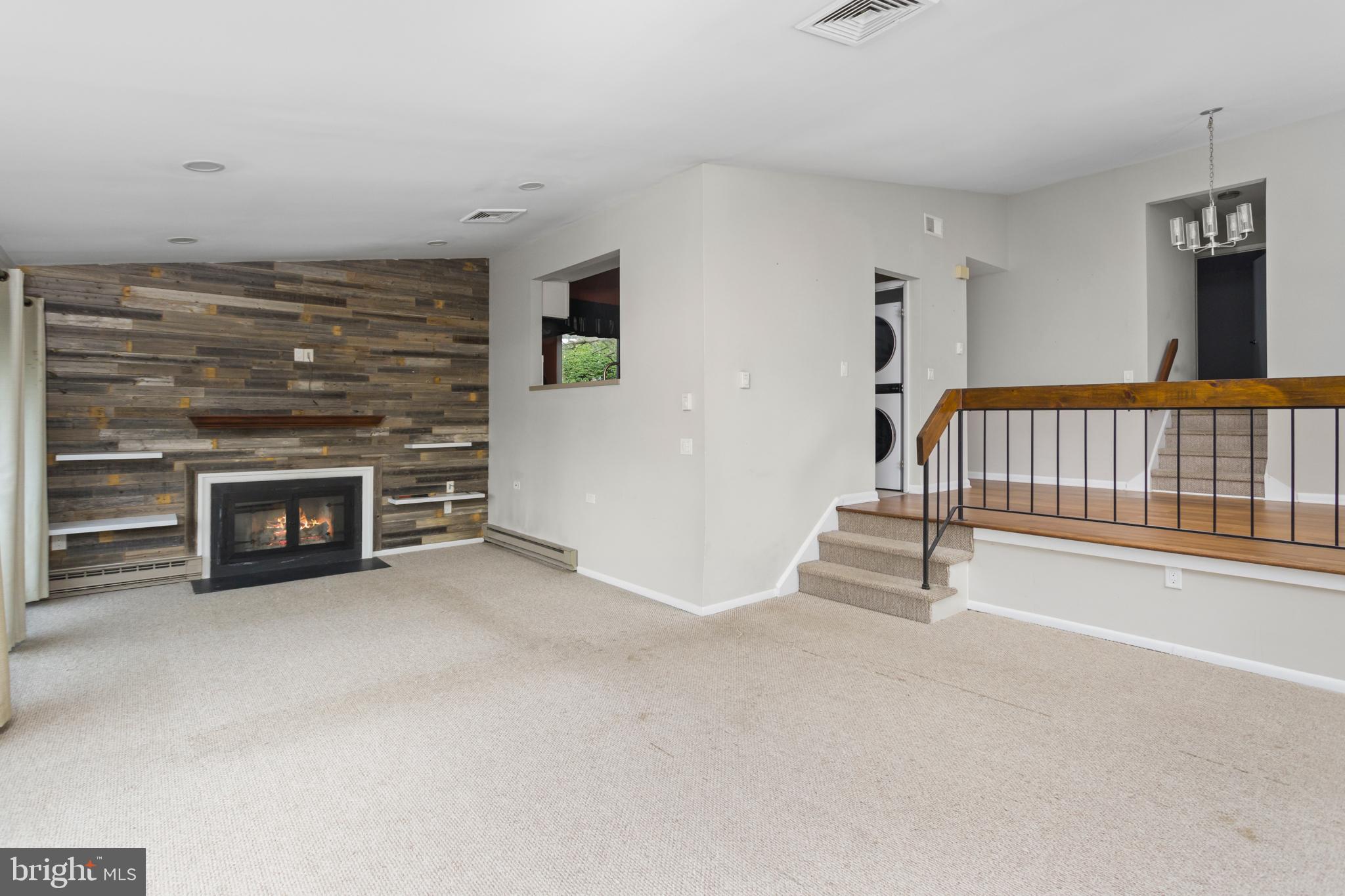 41 Overlook Drive Clinton, NJ 08809 - Photo 9 of 24 a view of an empty room with a fireplace