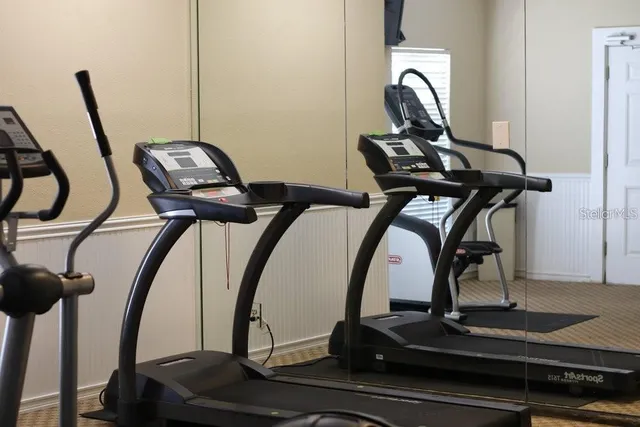 a view of a room with gym equipment