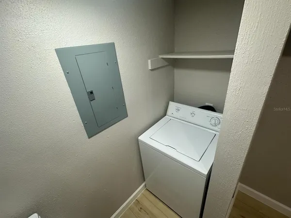 a utility room with dryer and washer