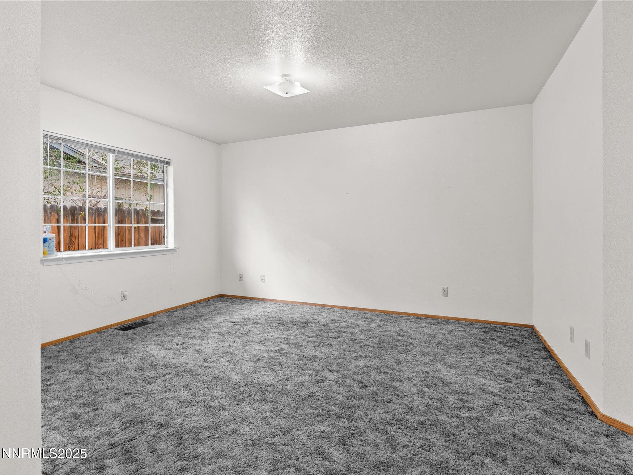 1951 Albert Street Fallon, NV 89406 - Photo 15 of 36 an empty room with windows