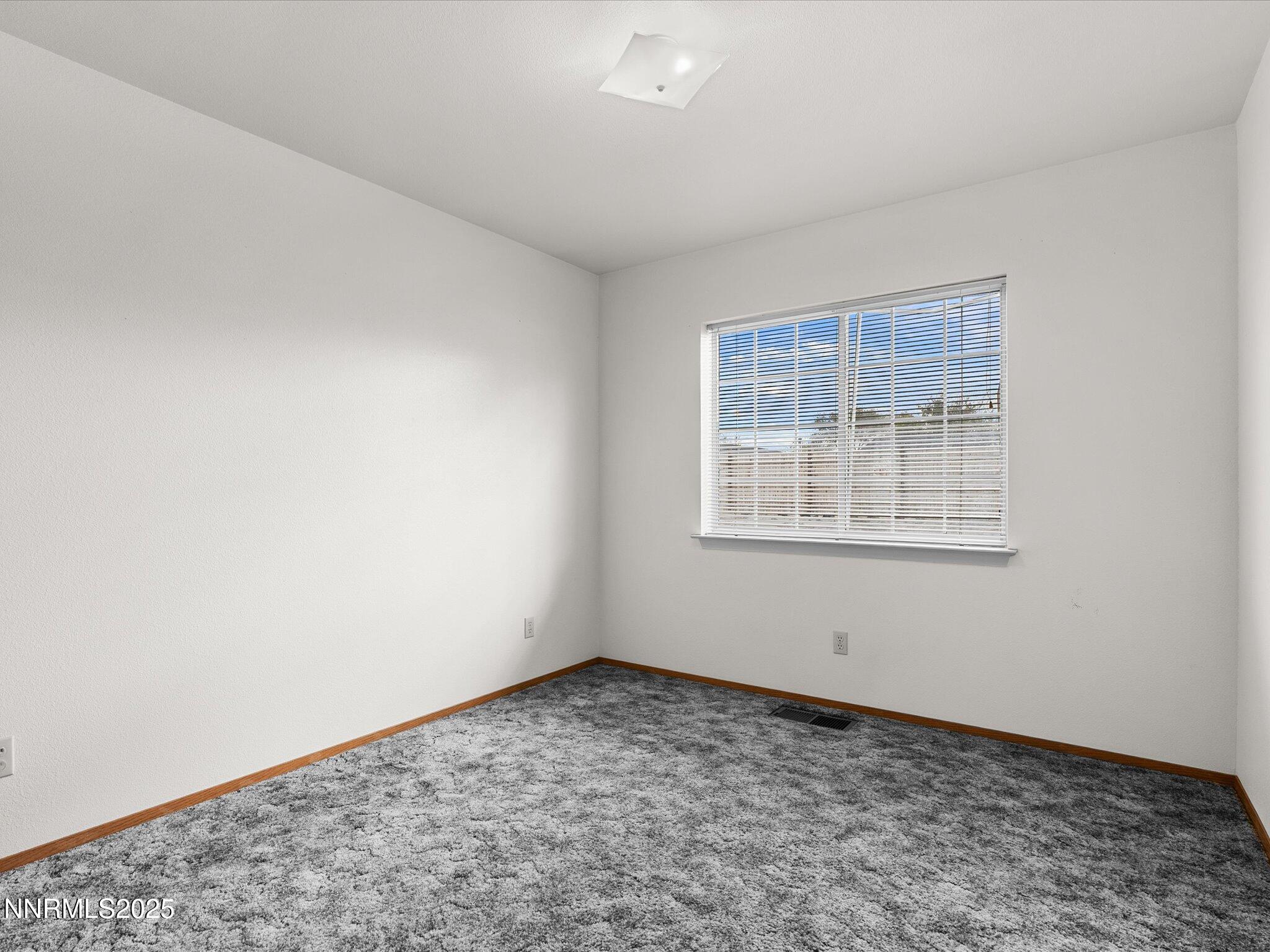 1951 Albert Street Fallon, NV 89406 - Photo 22 of 36 an empty room with a workbench