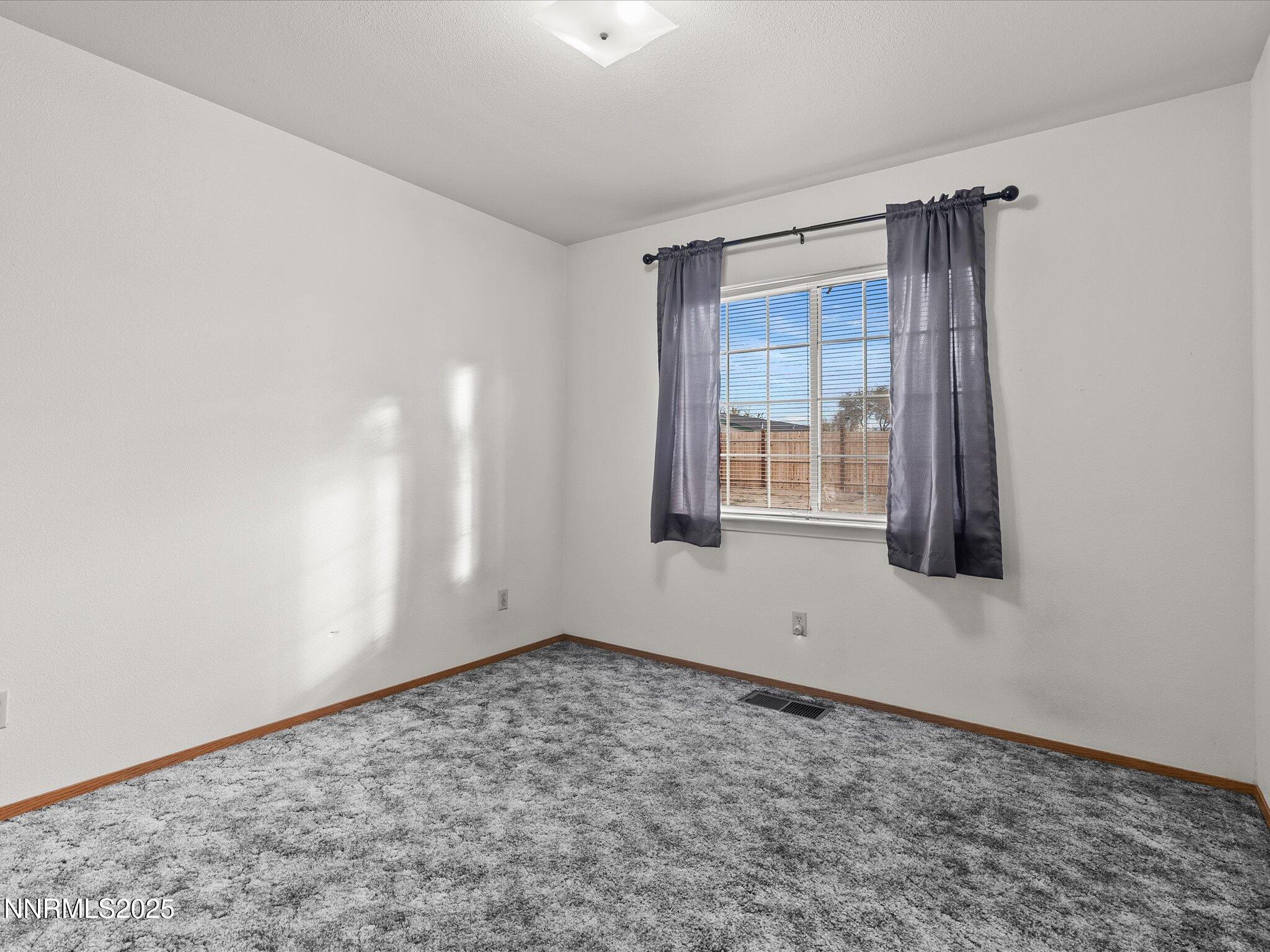 1951 Albert Street Fallon, NV 89406 - Photo 26 of 36 a view of an empty room with a window