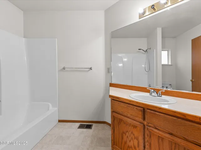 a bathroom with a sink and a bathtub