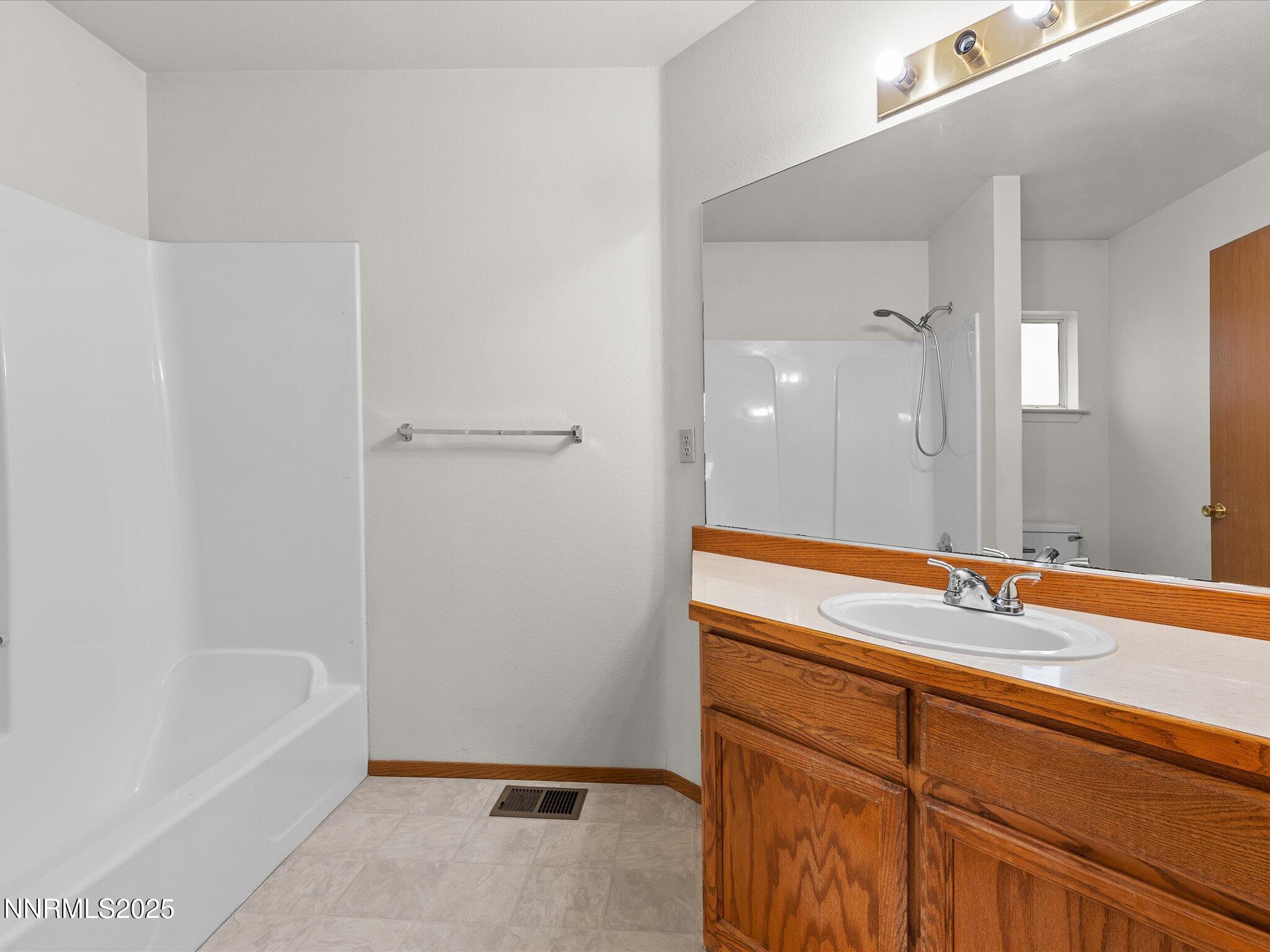 1951 Albert Street Fallon, NV 89406 - Photo 28 of 36 a bathroom with a sink and a bathtub