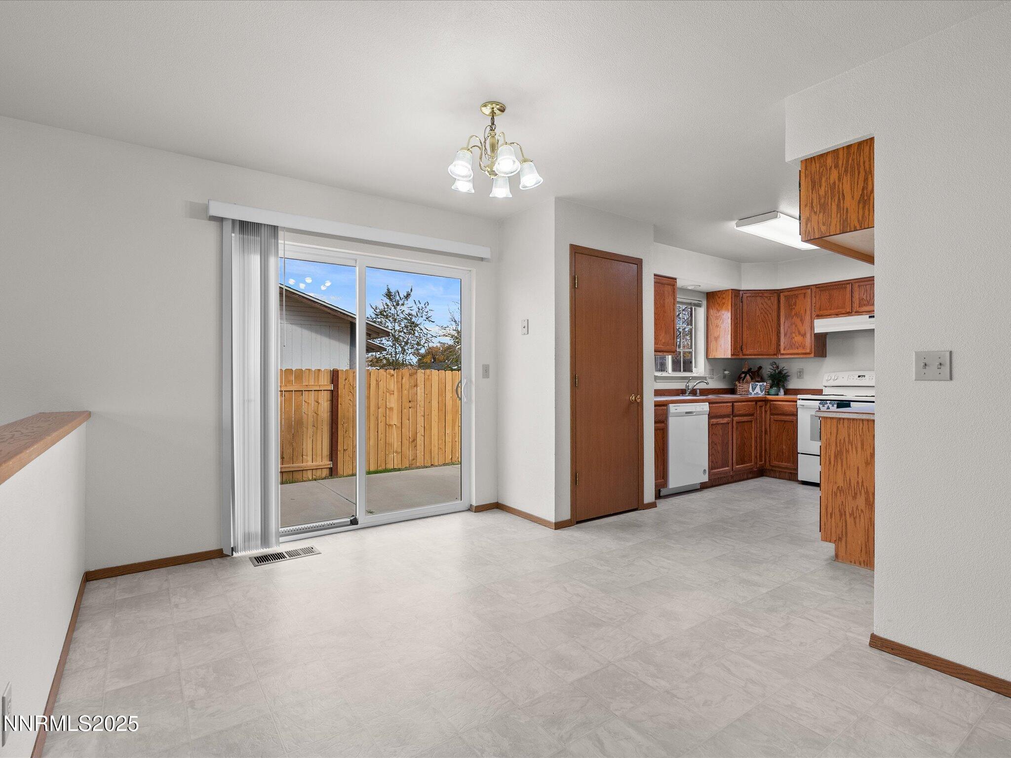 1951 Albert Street Fallon, NV 89406 - Photo 10 of 36 a view of a kitchen with a sink and cabinet