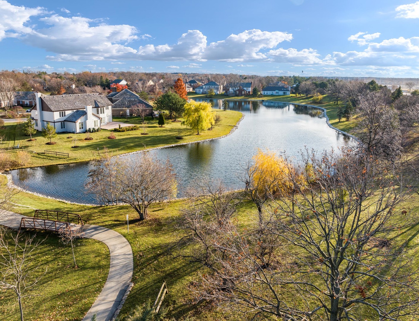 2500 Osage Drive Glenview, IL 60026 - Photo 13 of 77 a view of a lake with a mountain