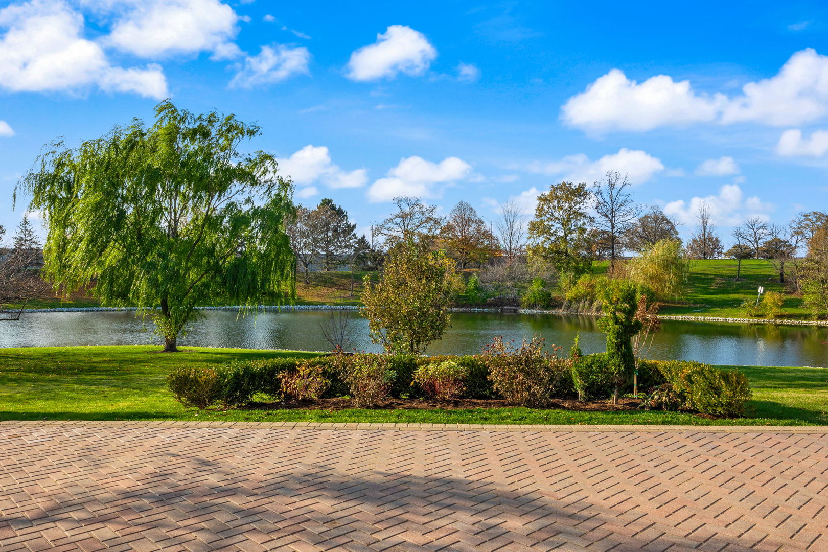 2500 Osage Drive Glenview, IL 60026 - Photo 15 of 77 a view of a lake and a yard