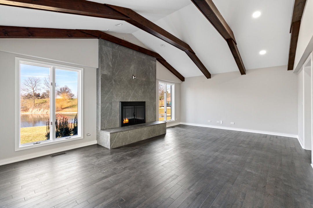 2500 Osage Drive Glenview, IL 60026 - Photo 20 of 77 a view of an empty room with wooden floor fire place and windows