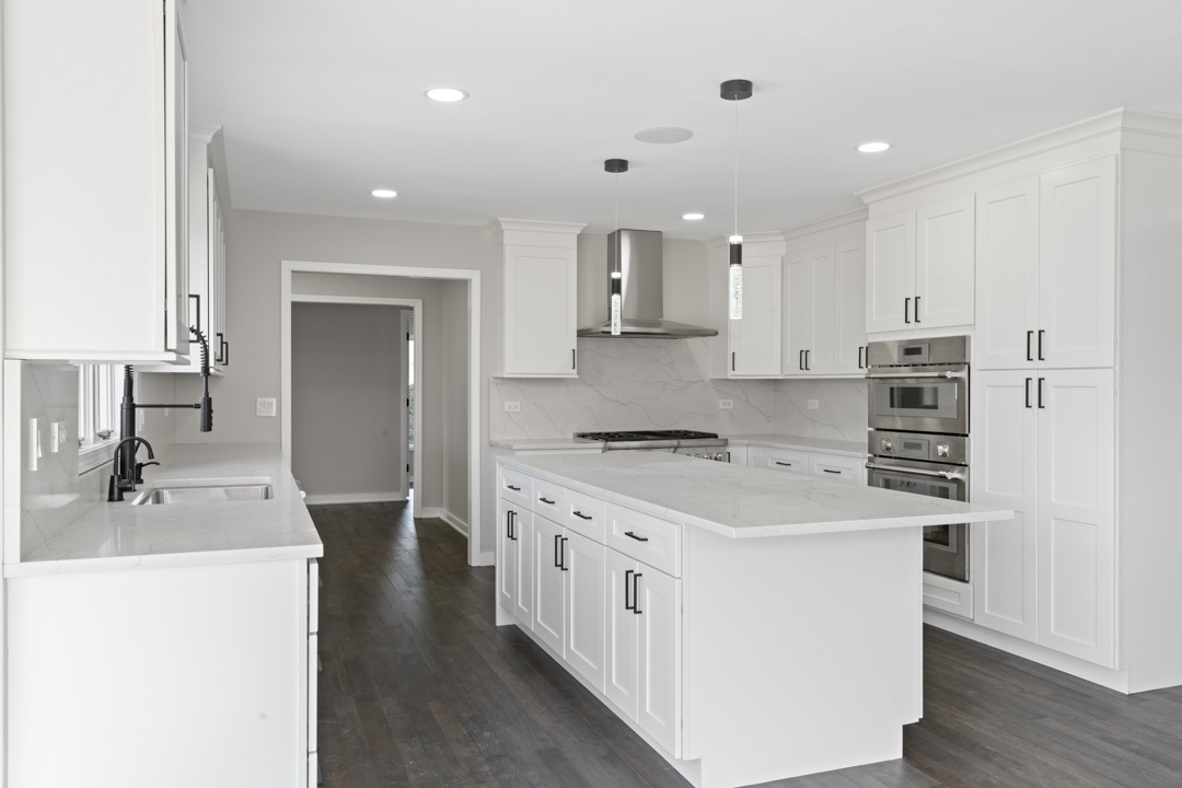 2500 Osage Drive Glenview, IL 60026 - Photo 31 of 77 a kitchen with stainless steel appliances granite countertop a sink stove and refrigerator