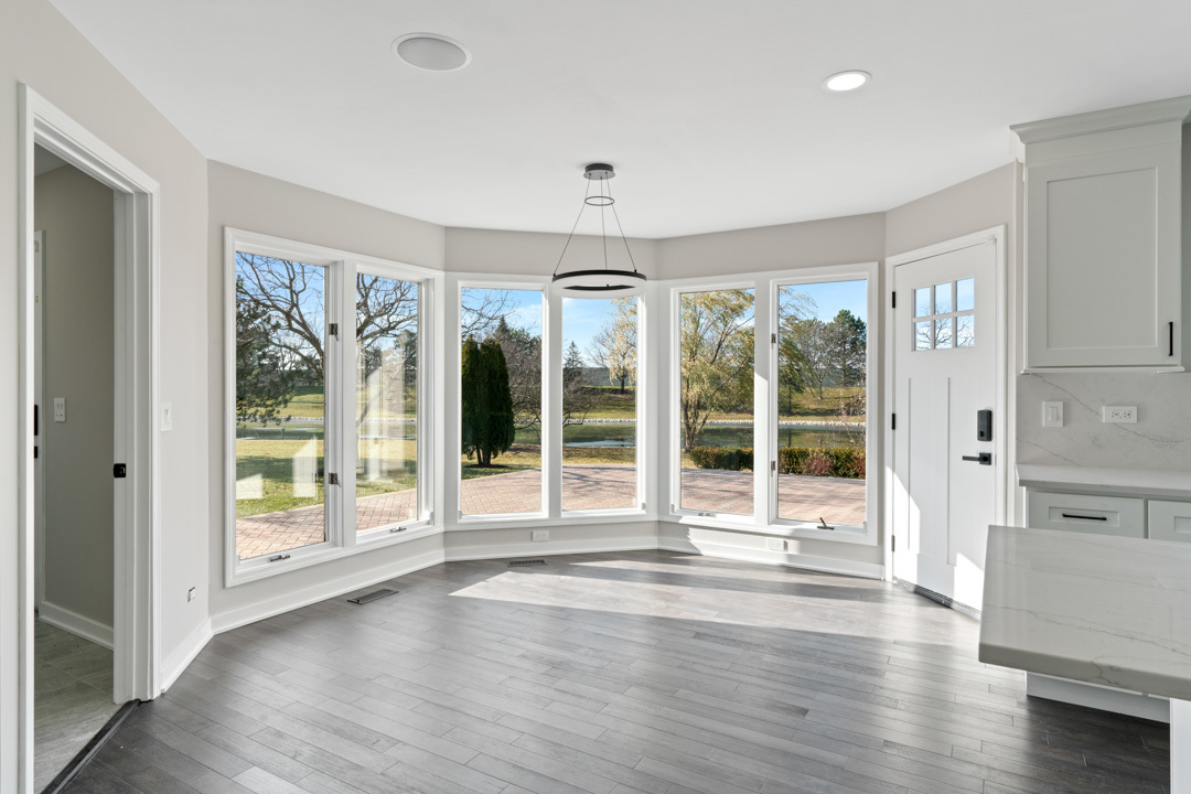 2500 Osage Drive Glenview, IL 60026 - Photo 34 of 77 a view of an entryway with wooden floor and windows