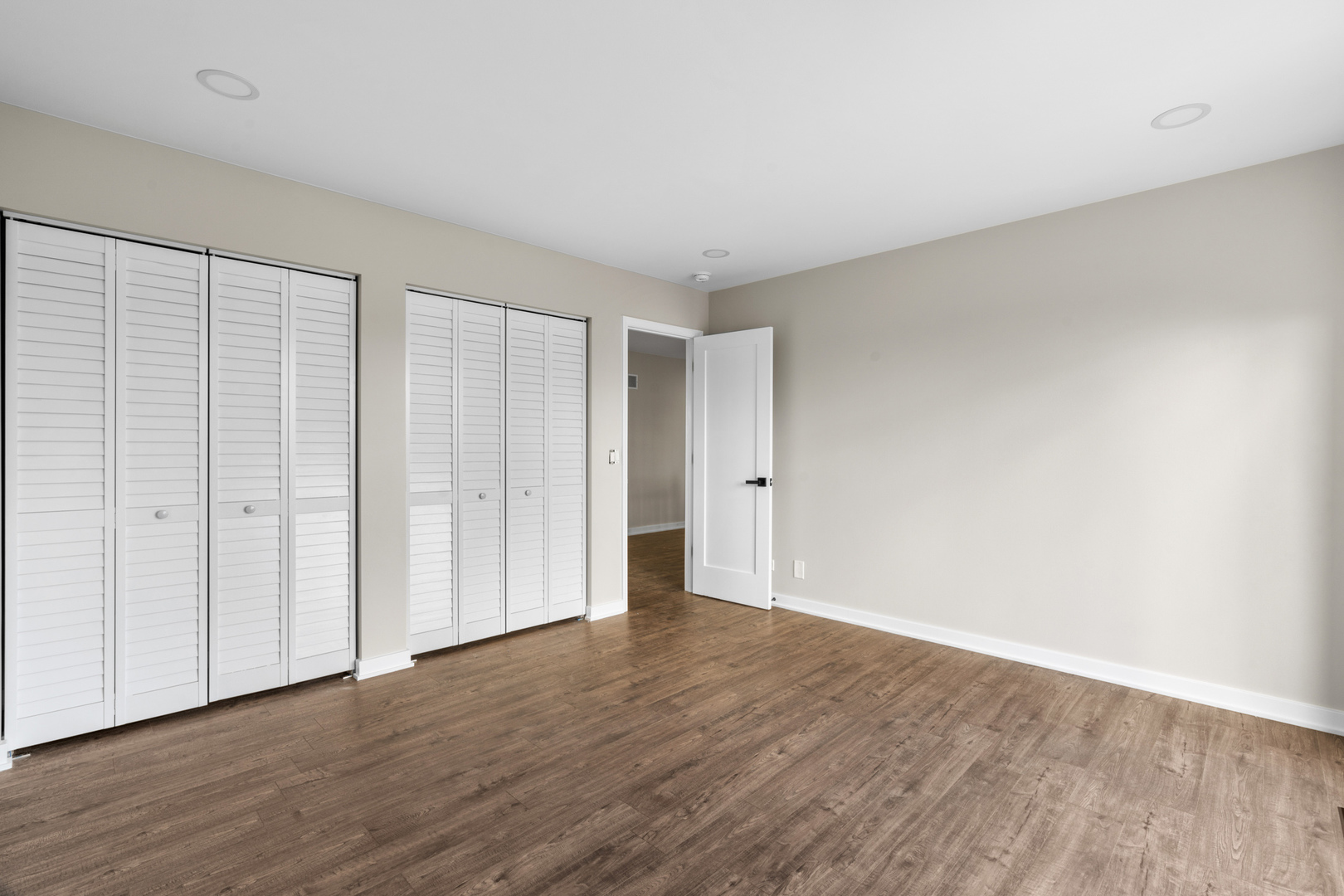 2500 Osage Drive Glenview, IL 60026 - Photo 36 of 77 a view of an empty room with wooden floor