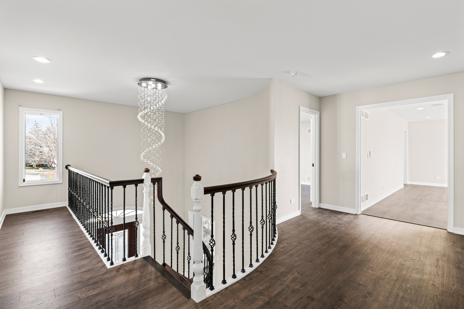 2500 Osage Drive Glenview, IL 60026 - Photo 45 of 77 a view of a hallway with wooden floor and windows
