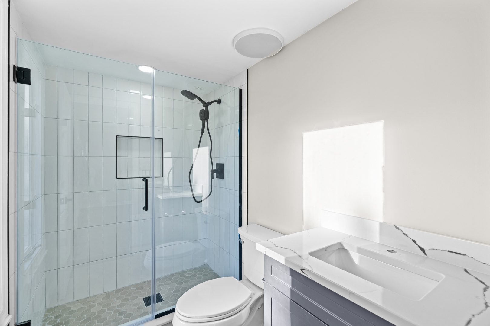 2500 Osage Drive Glenview, IL 60026 - Photo 51 of 77 a bathroom with a sink toilet and shower