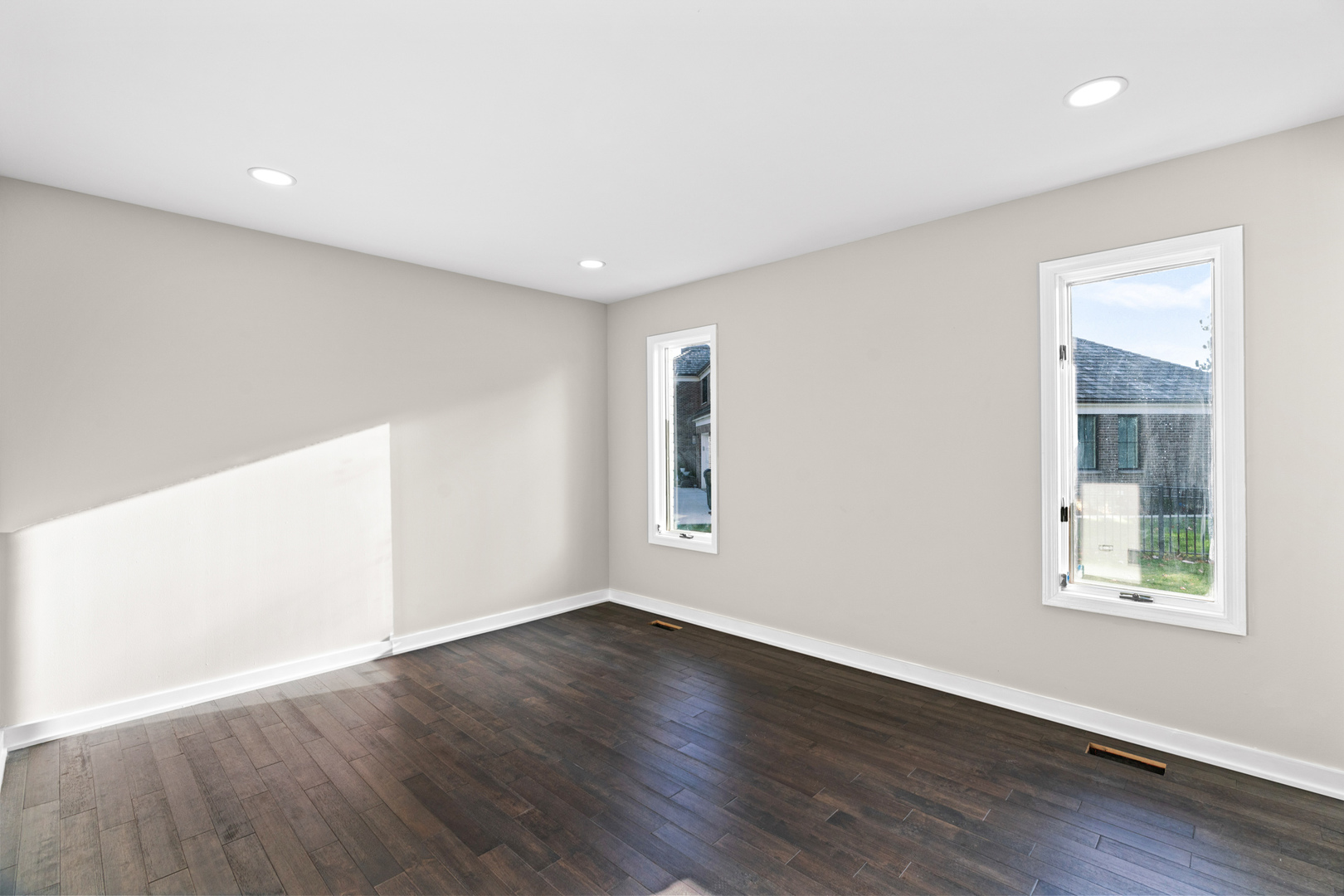 2500 Osage Drive Glenview, IL 60026 - Photo 52 of 77 a view of an empty room with wooden floor and a window