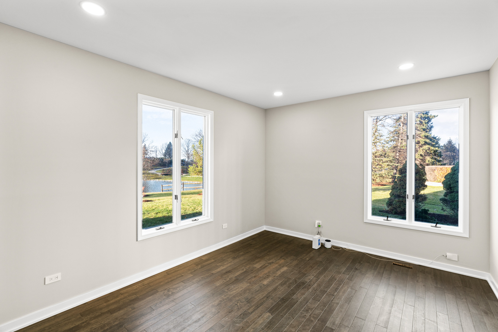 2500 Osage Drive Glenview, IL 60026 - Photo 53 of 77 an empty room with wooden floor and windows