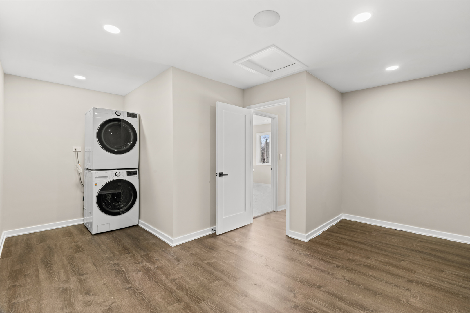 2500 Osage Drive Glenview, IL 60026 - Photo 55 of 77 a view of a hallway with washer and dryer