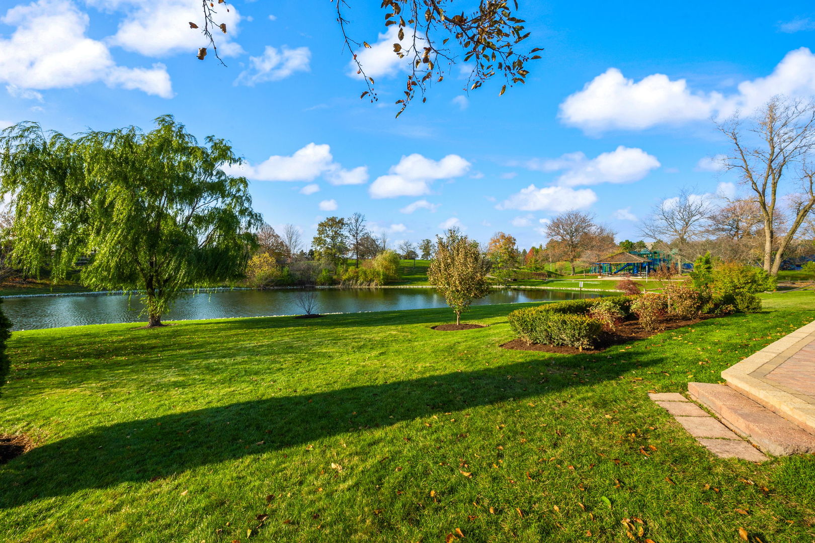 2500 Osage Drive Glenview, IL 60026 - Photo 7 of 77 a view of a golf course with a lake view