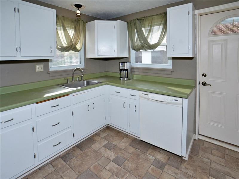 447 Agnew Road Jeannette, PA 15644 - Photo 3 of 23 Kitchen - lots of natural light from the two windows!