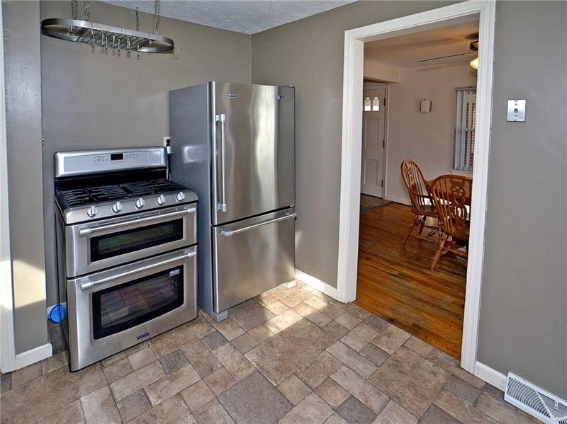 447 Agnew Road Jeannette, PA 15644 - Photo 5 of 23 Just off the kitchen is the dining room.