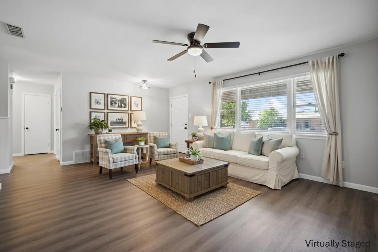 2004 45th Street Lubbock, TX 79412 - Photo 6 of 18 a living room with furniture and a large window