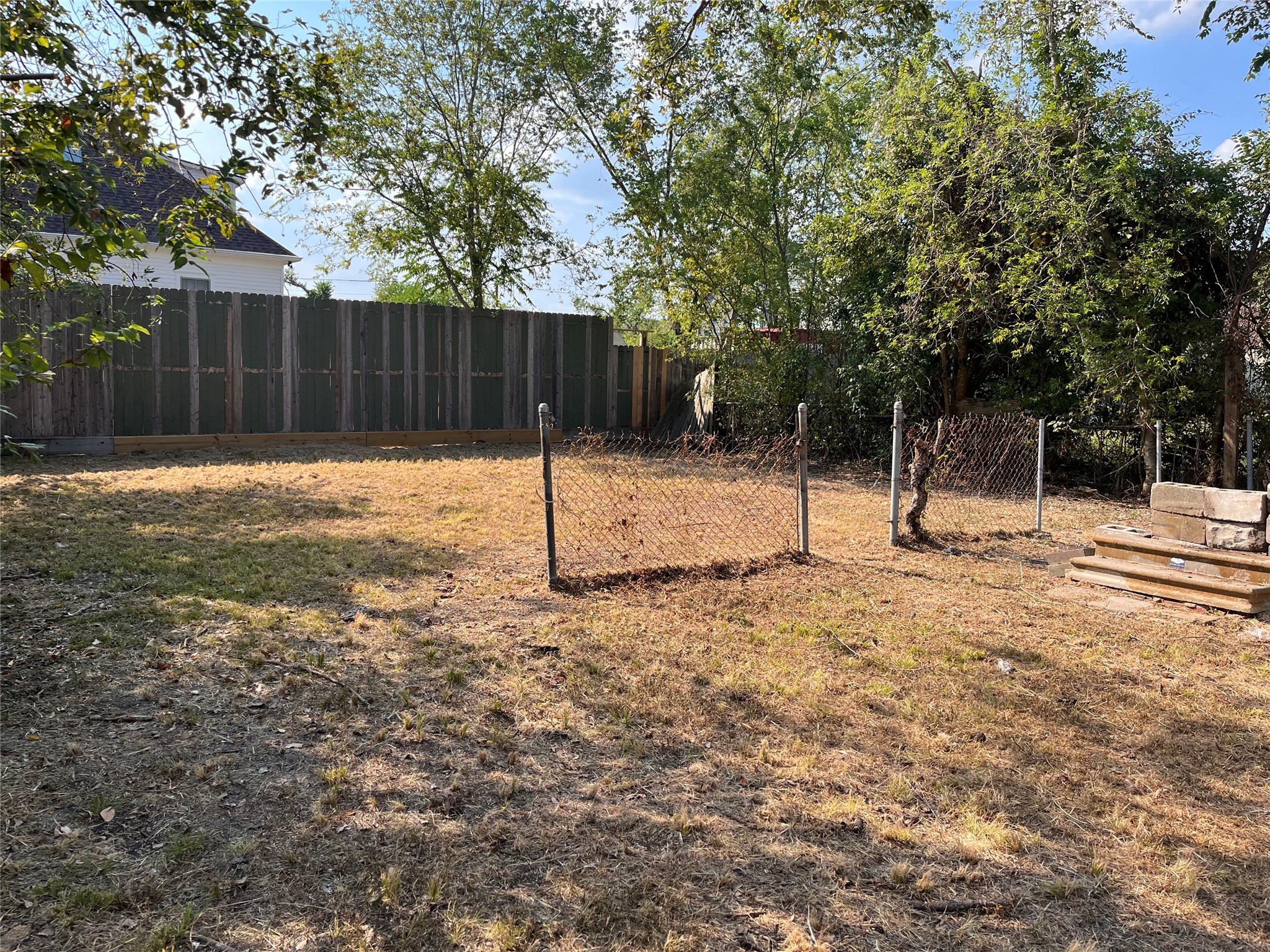 2007 Stevens Street Houston, TX 77026 - Photo 5 of 5 a backyard of a house with a tree