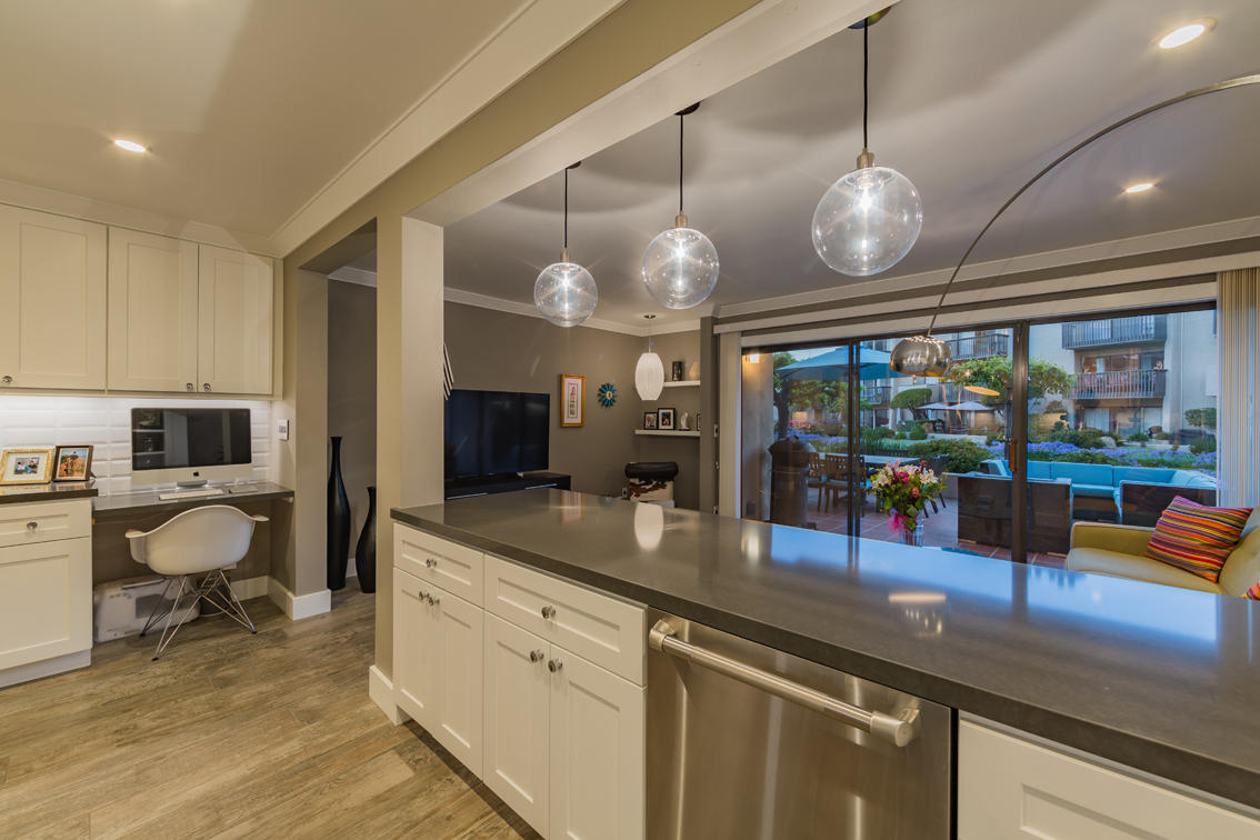 3375 Foothill Road, Unit 213 Carpinteria, CA 93013 - Photo 4 of 25 a large kitchen with a large counter space appliances and cabinets