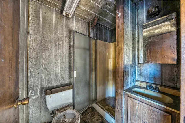 a view of street with red and white house