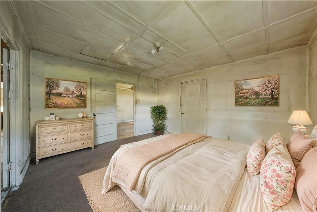 3527 Highway 20 Nice, CA 95464 - Photo 10 of 29 a bedroom with a bed and a dresser in it