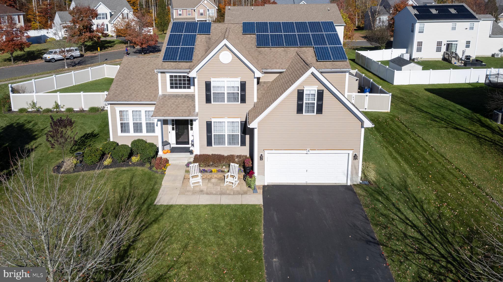 63 Homestead Drive Pemberton, NJ 08068 - Photo 2 of 46 a view of multiple houses with a yard