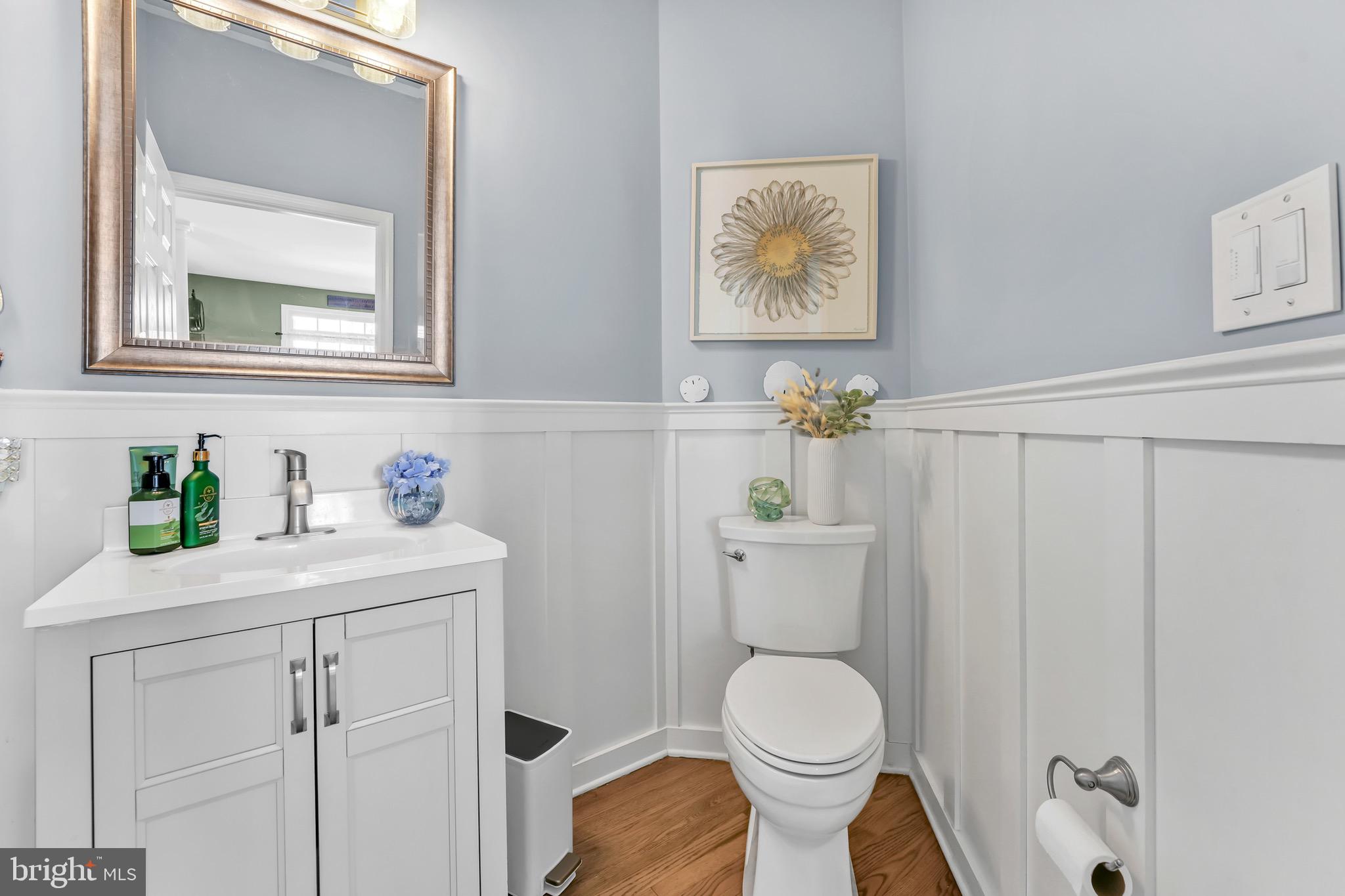 63 Homestead Drive Pemberton, NJ 08068 - Photo 23 of 46 a bathroom with a toilet a sink and mirror