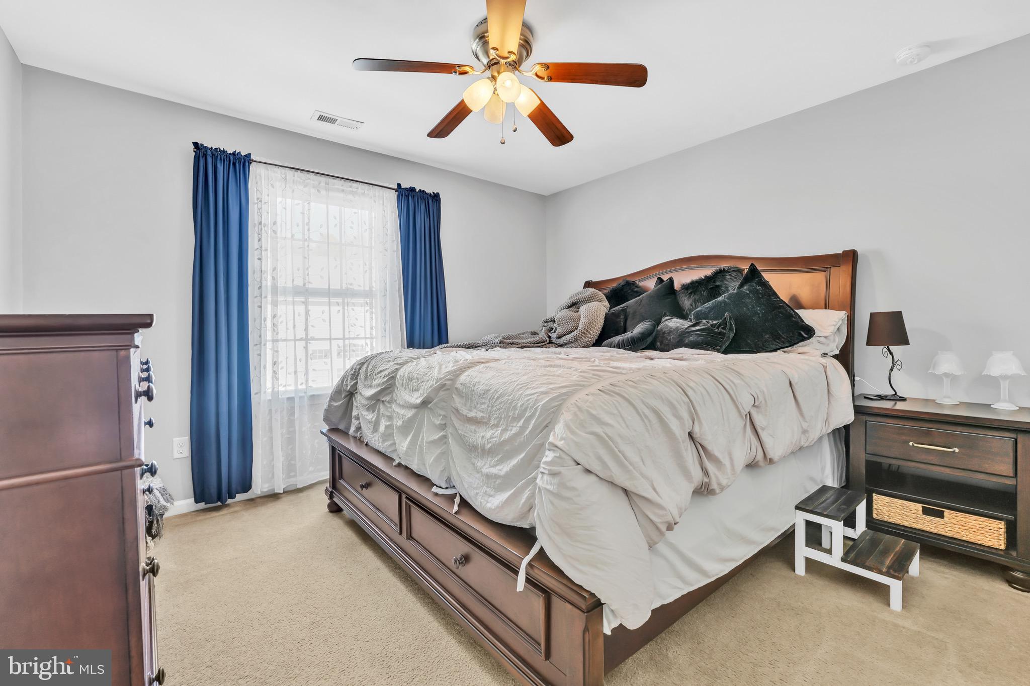 63 Homestead Drive Pemberton, NJ 08068 - Photo 30 of 46 a bedroom with a bed and a ceiling fan