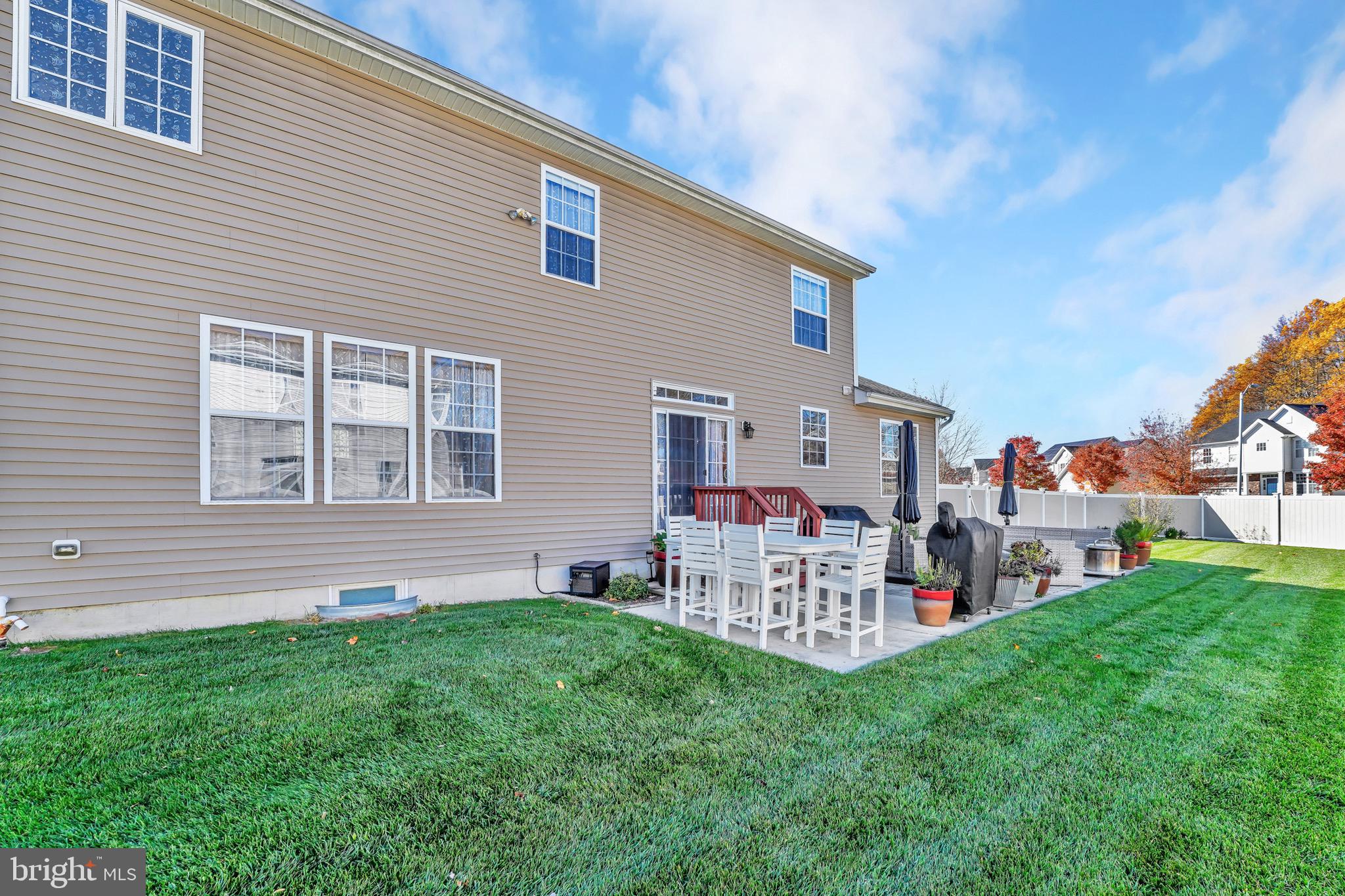 63 Homestead Drive Pemberton, NJ 08068 - Photo 35 of 46 a front view of house with yard and outdoor seating