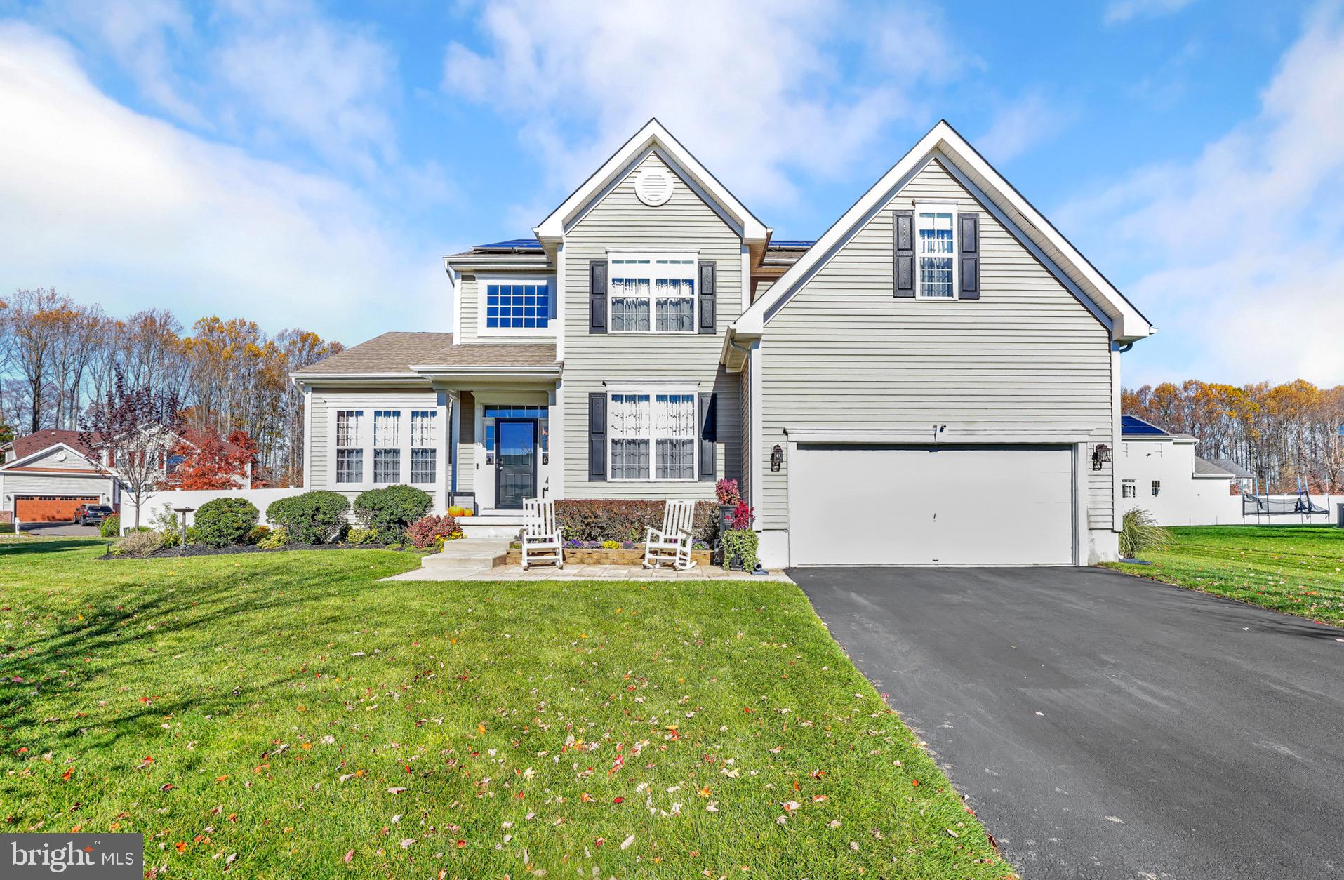 63 Homestead Drive Pemberton, NJ 08068 - Photo 38 of 46 a view of a house with a yard and sitting area